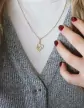 Pendentif Deux Cœurs enlacés en Or
