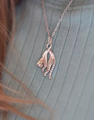 Pendentif Panthère Tigrée en Or Œil Diamant