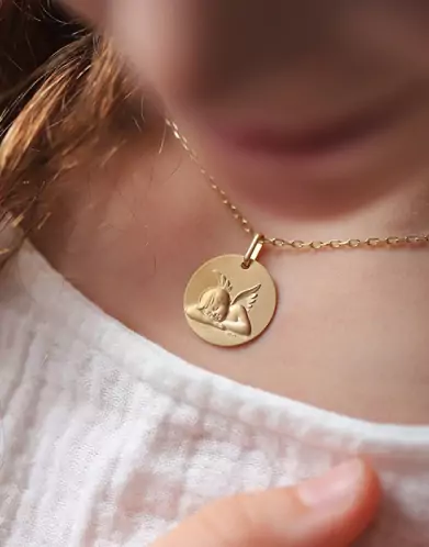 Médaille ronde Ange qui dort en relief