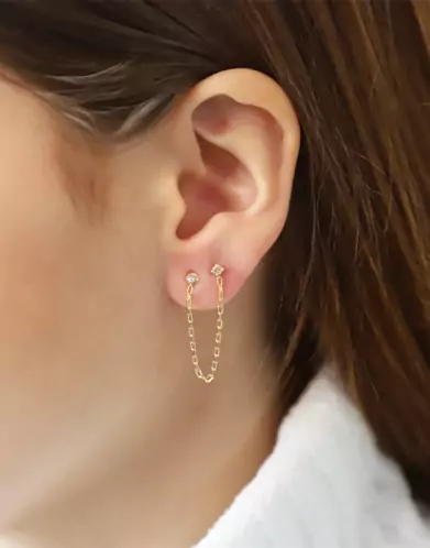 Boucles d'oreilles à chaine 2 trous et diamants en or